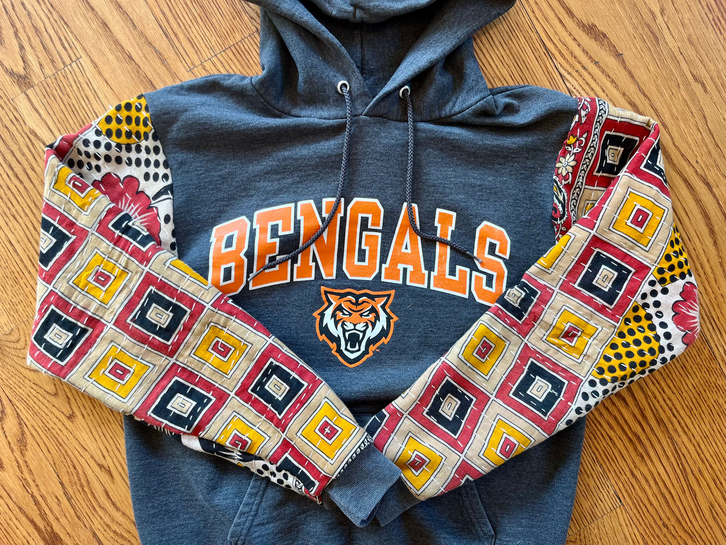 A. Upcycled women’s small hoodie