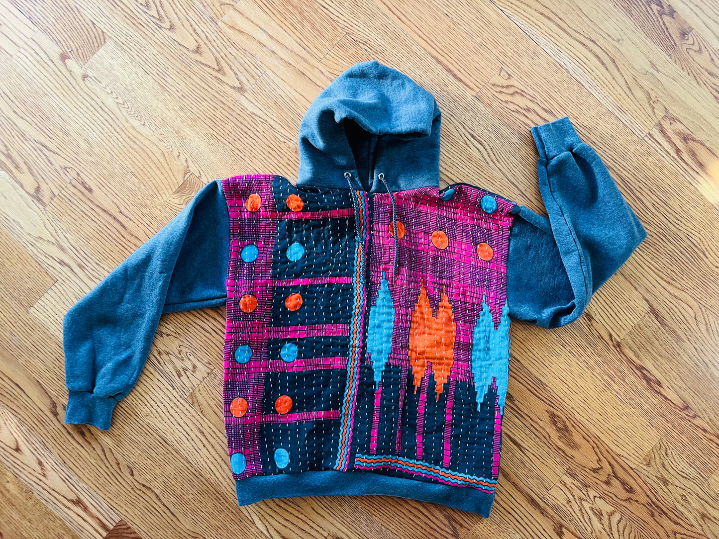 A. Upcycled hoodie mens med/large