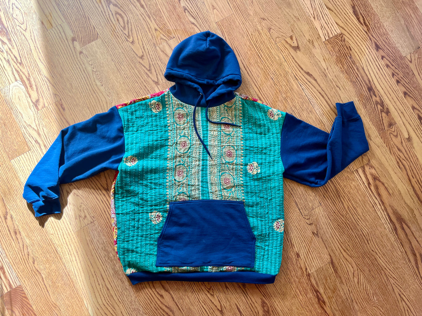 A. Upcycled men’s large hoodie