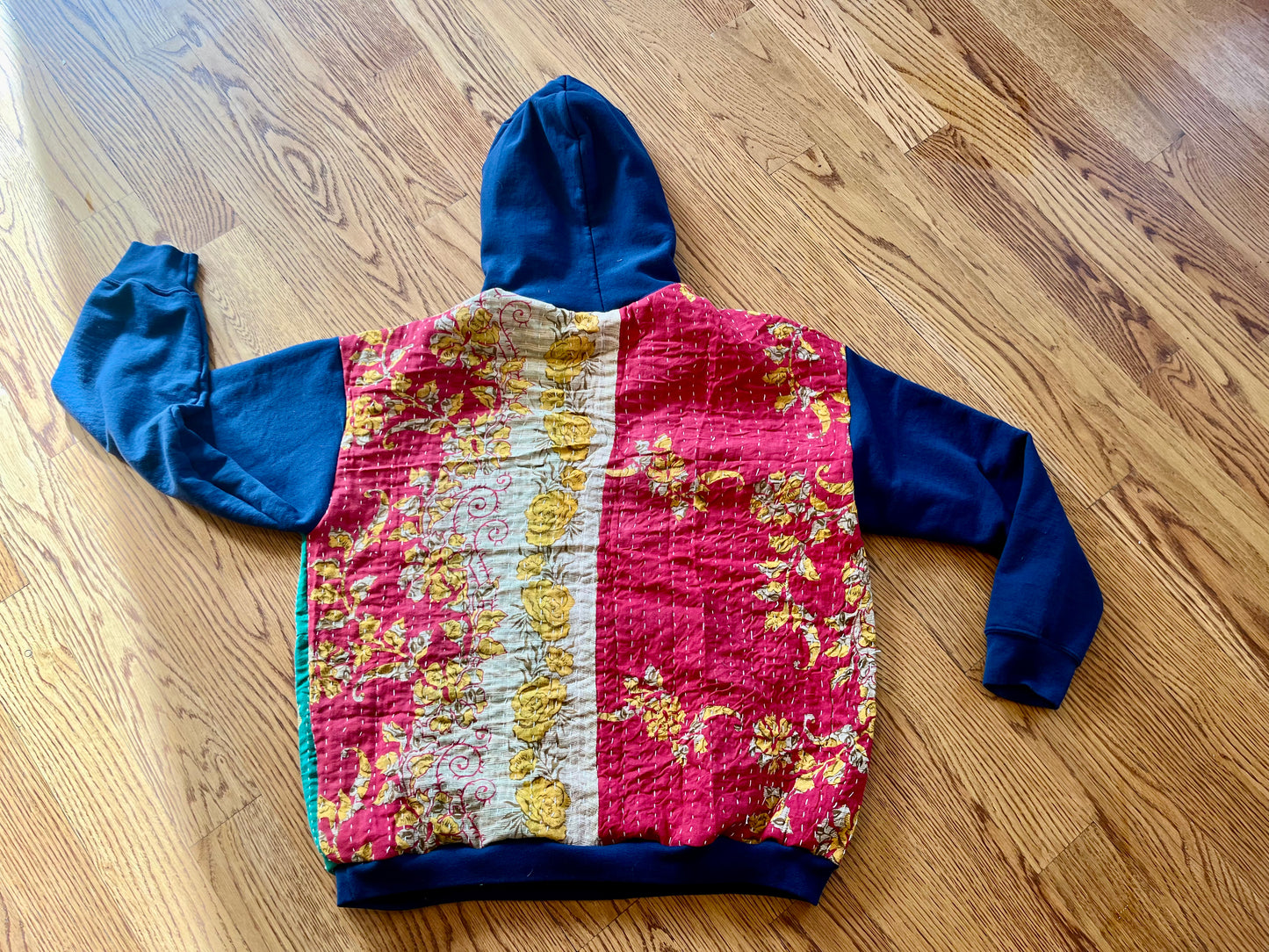 A. Upcycled men’s large hoodie